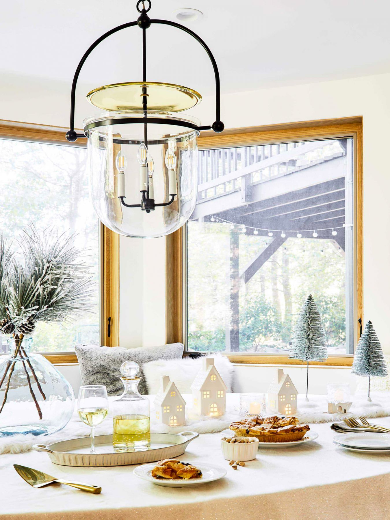 Interior stylist Emily Henderson created a snowy tablescape with a faux fur runner (Image: Nicole Michalou/Pexels)