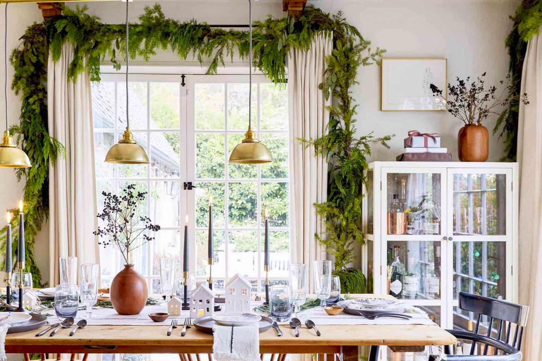 Interior stylist Emily Henderson dressed up the table with festive installations to imbue holiday cheer (Photographed by Sara Ligorria-Tramp for Emily Henderson Design)