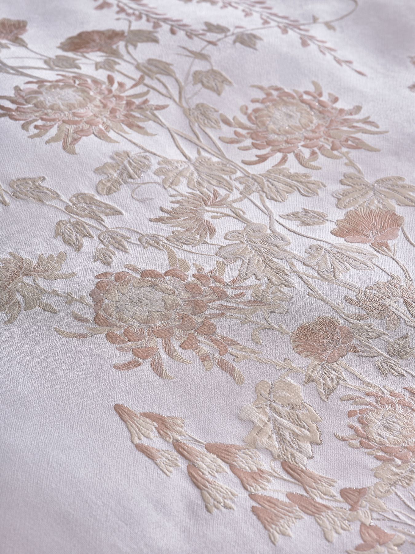 Intricate floral motifs are inspired by the blossoms often found in royal gardens