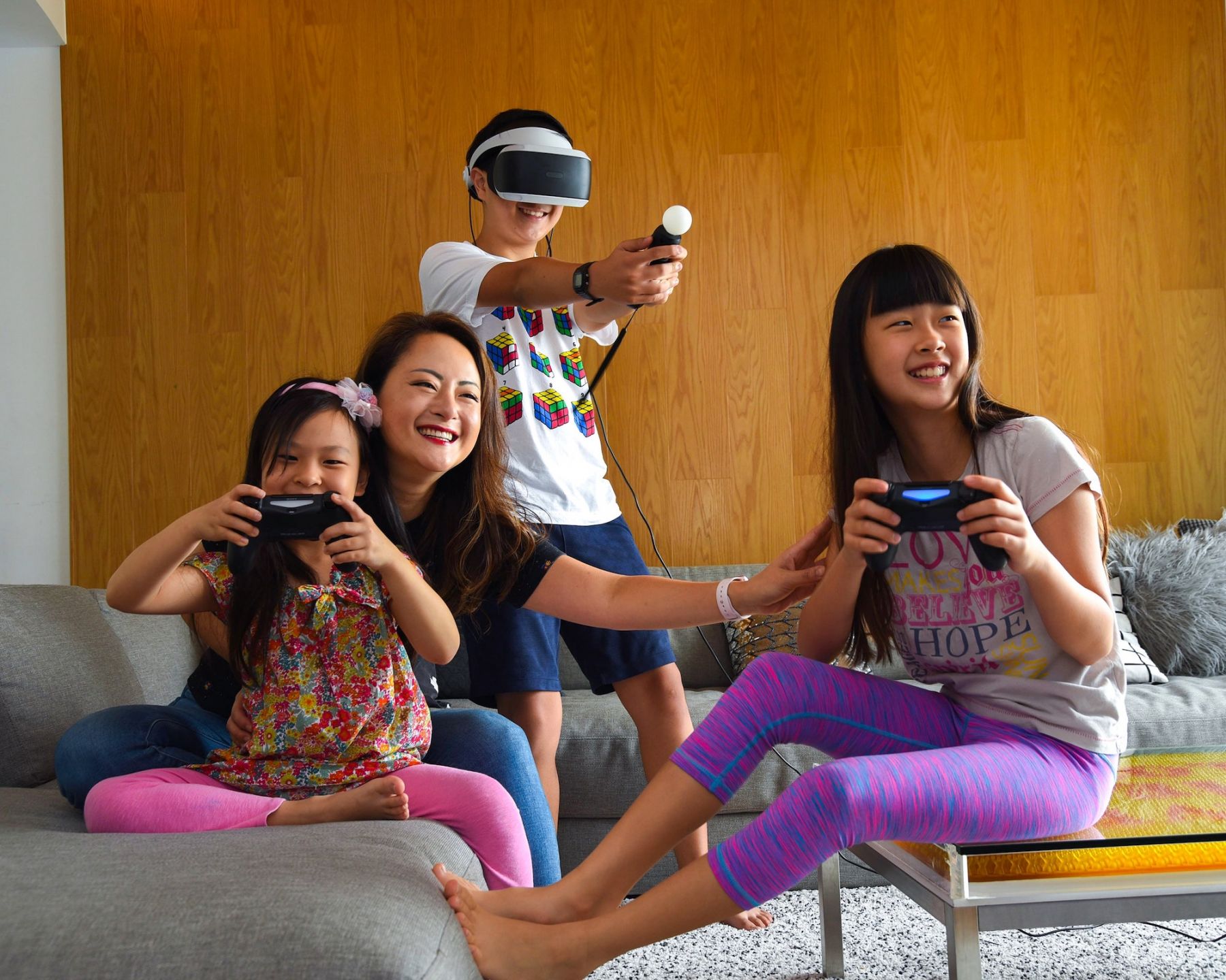 Arcadia Kim of Infinite Screentime playing games with three kids