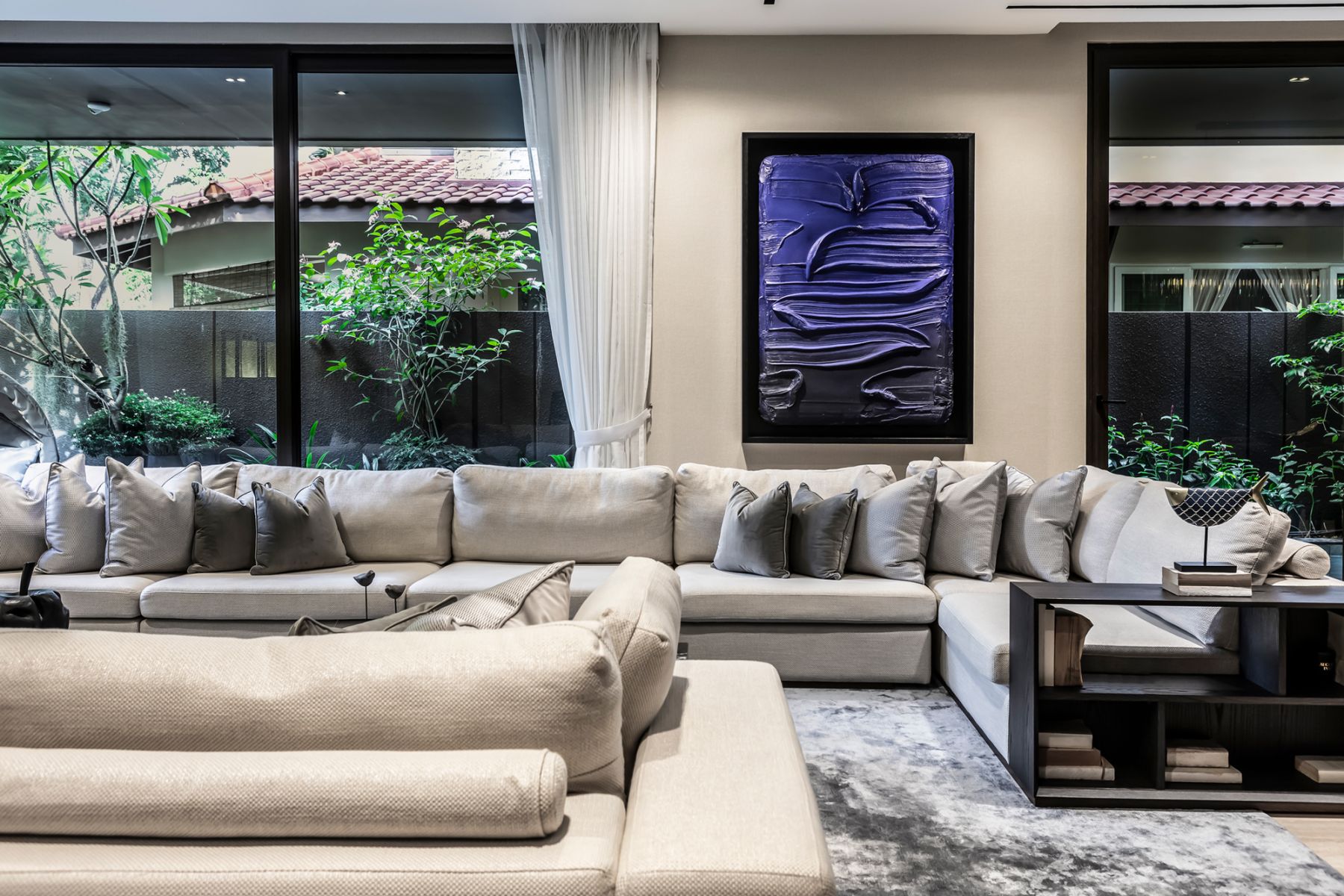 The homeowners love for hosting guests is reflected in the living room's design