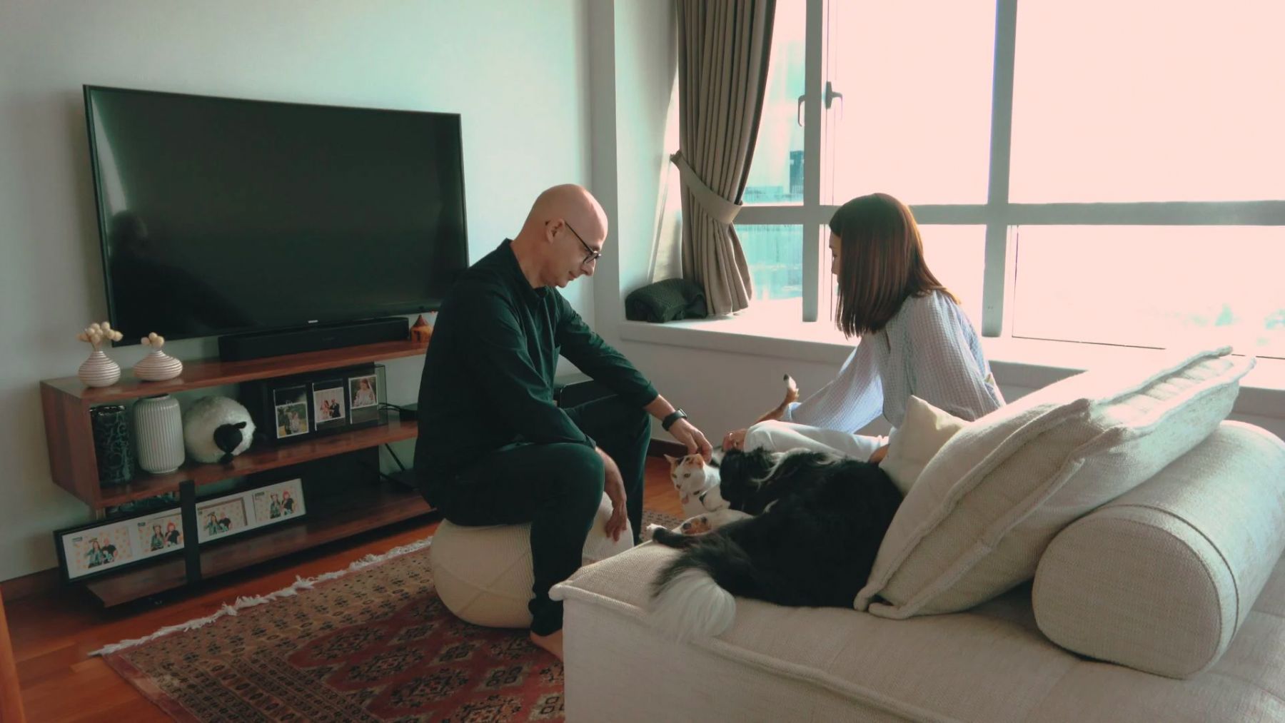 The couple enjoy spending time with their pets in their master bedroom