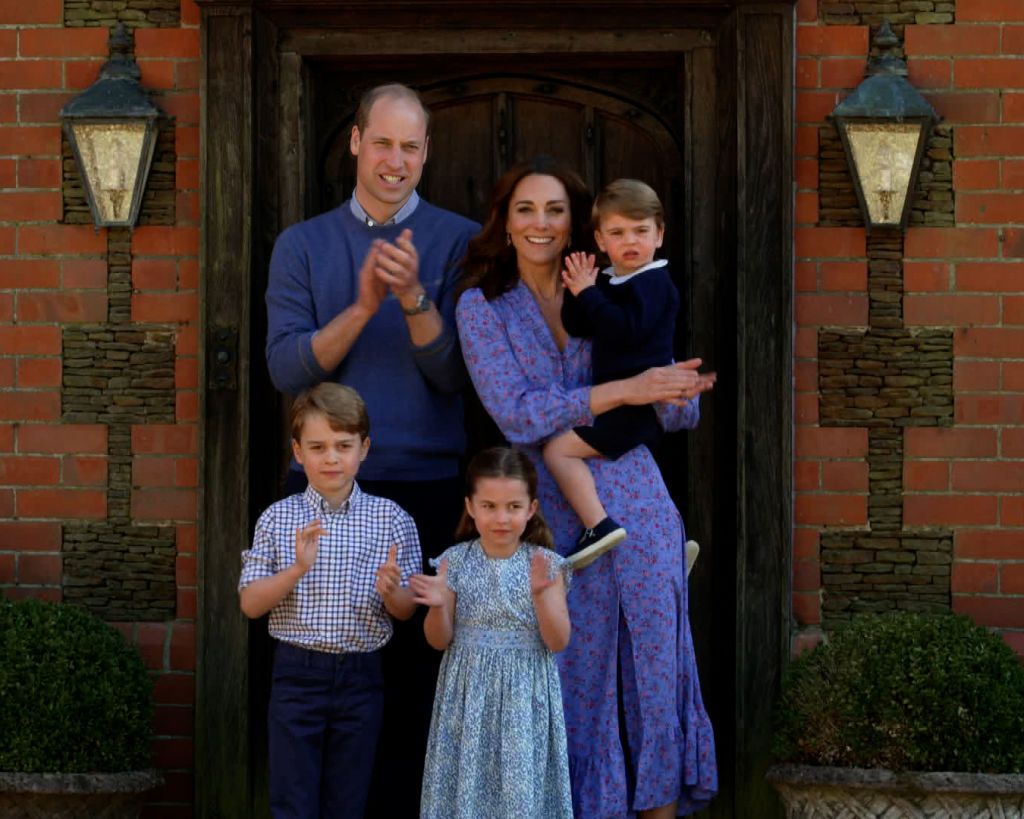 LONDON, ENGLAND - APRIL 23: In this screengrab, Prince William, Duke of Cambridge, Catherine Duchess of Cambridge, Prince George of Cambridge, Princess Charlotte of Cambridge and Prince Louis of Cambridge clap for NHS carers as part of the BBC Children In Need and Comic Relief 'Big Night In at London on April 23, 2020 in London, England.The 'Big Night In' brings the nation an evening of unforgettable entertainment in a way we've never seen before. Raising money for and paying tribute to those on the front l