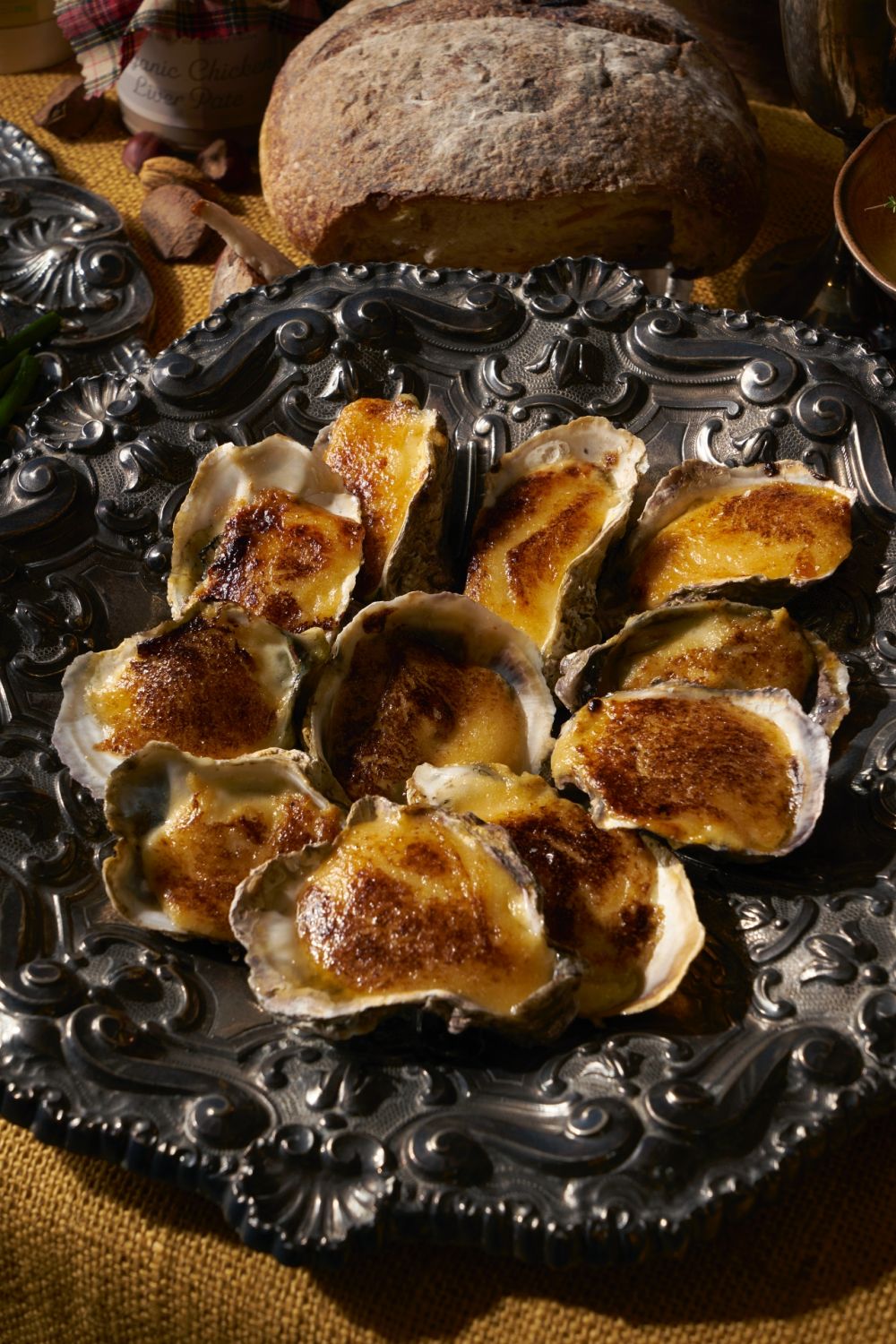 Baked oysters from Wantusawa on a vintage silver dish from W/17 | Photo by Sonny Thakur