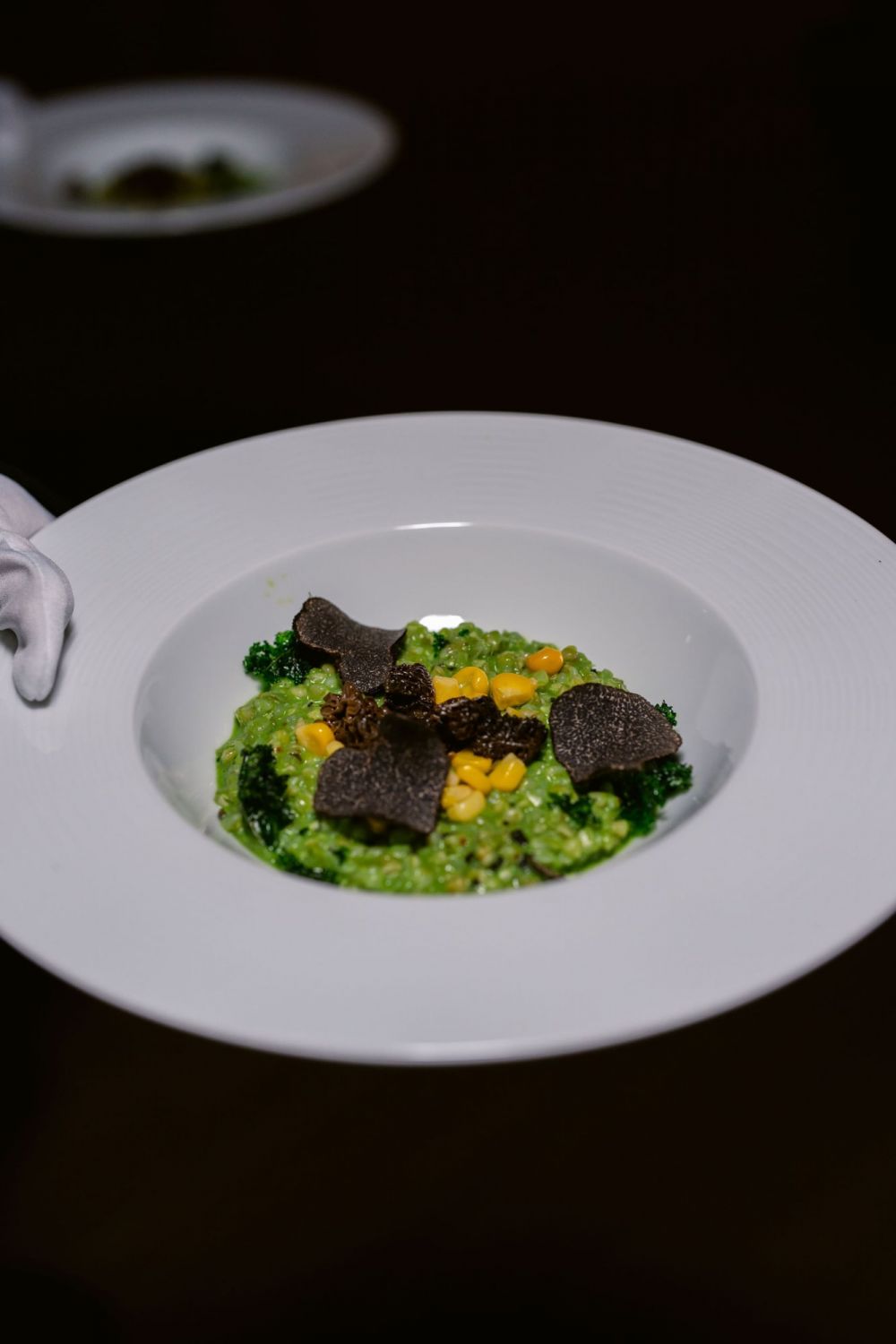Buckwheat risotto with morels, black truffle, locally farmed organic corn and kale. (Photo: Anna Koustas)