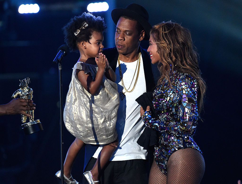 INGLEWOOD, CA - AUGUST 24:  Blue Ivy Carter, Jay Z and Beyonce onstage during the 2014 MTV Video Music Awards at The Forum on August 24, 2014 in Inglewood, California.  (Photo by Kevin Mazur/MTV1415/WireImage)