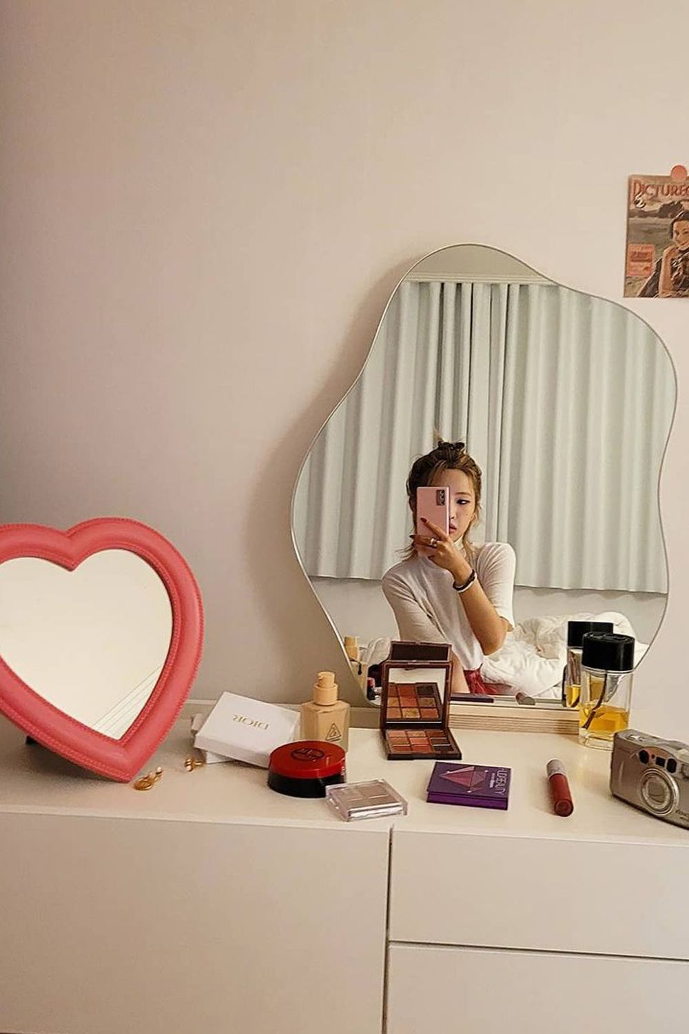 Found throughout her abode, the vibrant mirrors add a colourful touch