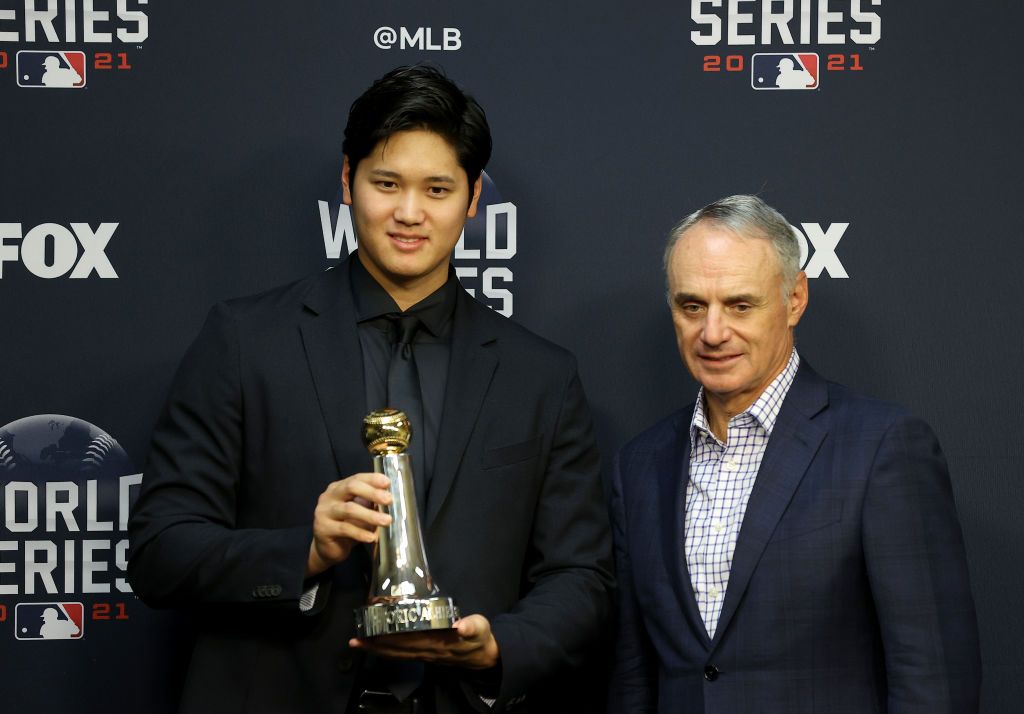 HOUSTON, TEXAS - OCTOBER 26: Major League Baseball Commissioner Rob Manfred presents Shohei Ohtani of the Los Angeles Angels with the Commissioner's Historic Achievement Award prior to Game One of the World Series between the Atlanta Braves and the Houston Astros at Minute Maid Park on October 26, 2021 in Houston, Texas. (Photo by Bob Levey/Getty Images)
