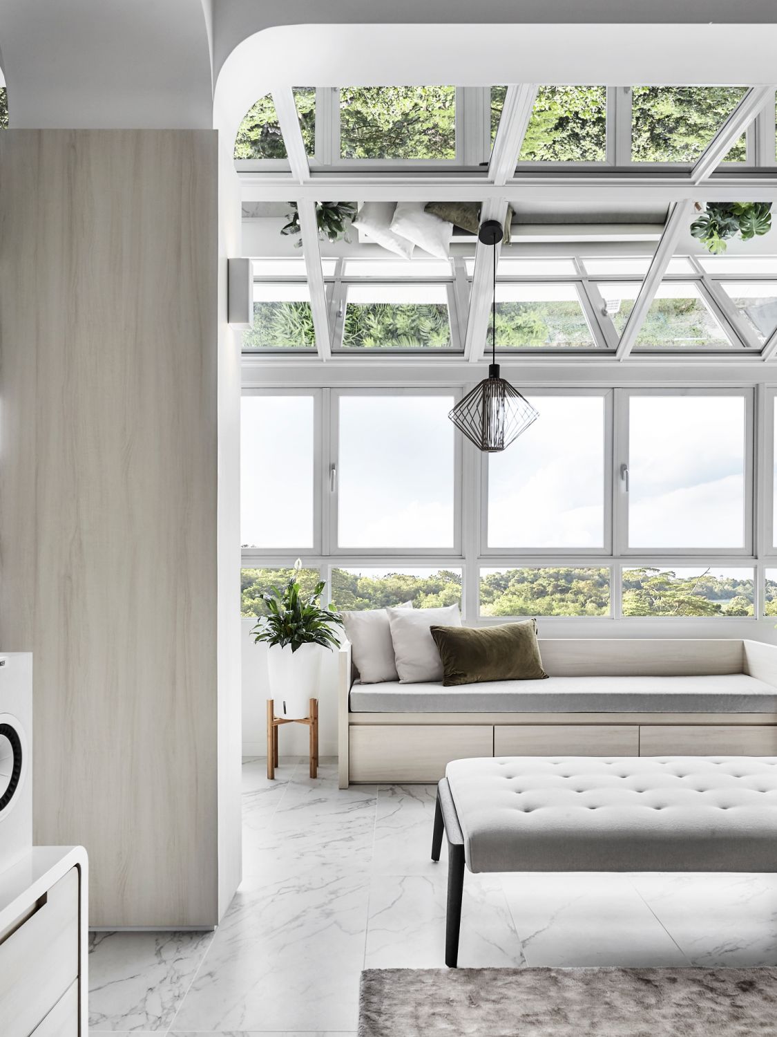 The former balcony area was converted into a stylish space for socialising