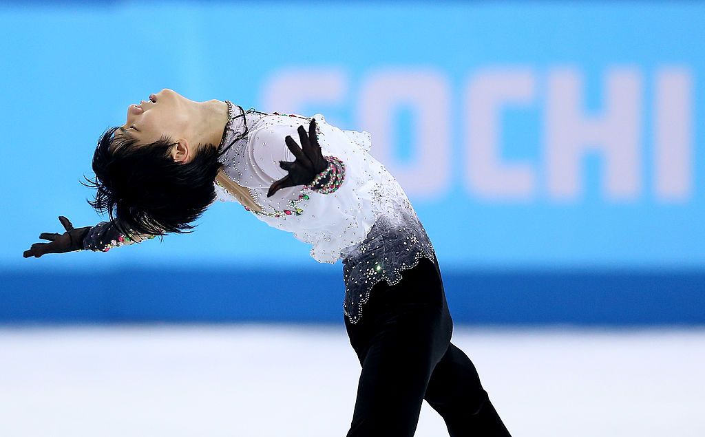 SOCHI, RUSSIA - FEBRUARY 14:  Yuzuru Hanyu of Japan competes during the Figure Skating Men's Free Skating on day seven of the Sochi 2014 Winter Olympics at Iceberg Skating Palace on February 14, 2014 in Sochi, Russia.  (Photo by Matthew Stockman/Getty Images)