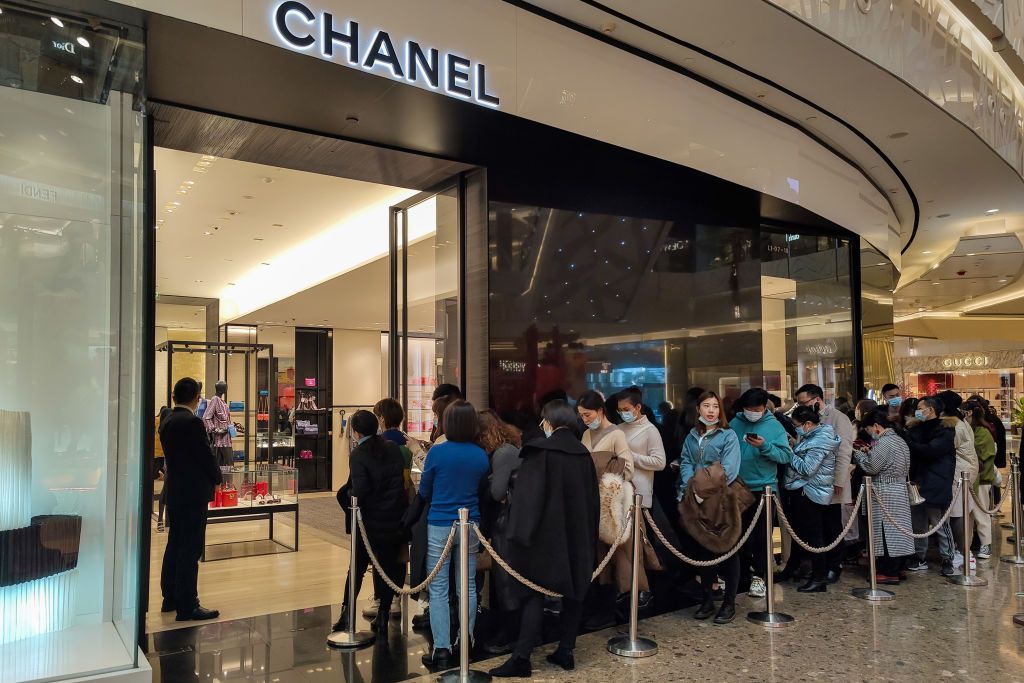 SHANGHAI, CHINA - FEBRUARY 18, 2021 - Shoppers line up in front of luxury stores at the Lujiazui International Gold Center in Pudong, east China's Shanghai, Feb 18, 2021.- PHOTOGRAPH BY Costfoto / Barcroft Studios / Future Publishing (Photo credit should read Costfoto/Barcroft Media via Getty Images)