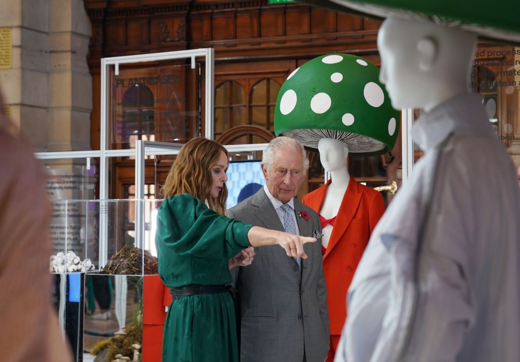 GLASGOW, SCOTLAND - NOVEMBER 03: Prince Charles, Prince of Wales speaks to designer and sustainability advocate Stella McCartney as he views a fashion installation by the designer, at the Kelvingrove Art Gallery and Museum, during the Cop26 summit being held at the Scottish Event Campus (SEC) on November 3, 2021 in Glasgow, Scotland. 2021 sees the 26th United Nations Climate Change Conference which will run from 31 October for two weeks, finishing on 12 November. It was meant to take place in 2020 but was d
