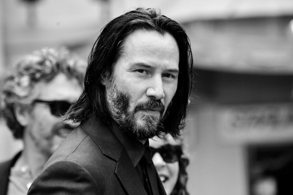 HOLLYWOOD, CALIFORNIA - MAY 14: (EDITORS NOTE; Image has been converted to black and white) Keanu Reeves attends 'Keanu Reeves places his hand prints in cement' at TCL Chinese Theatre IMAX on May 14, 2019 in Hollywood, California. (Photo by Emma McIntyre/Getty Images)