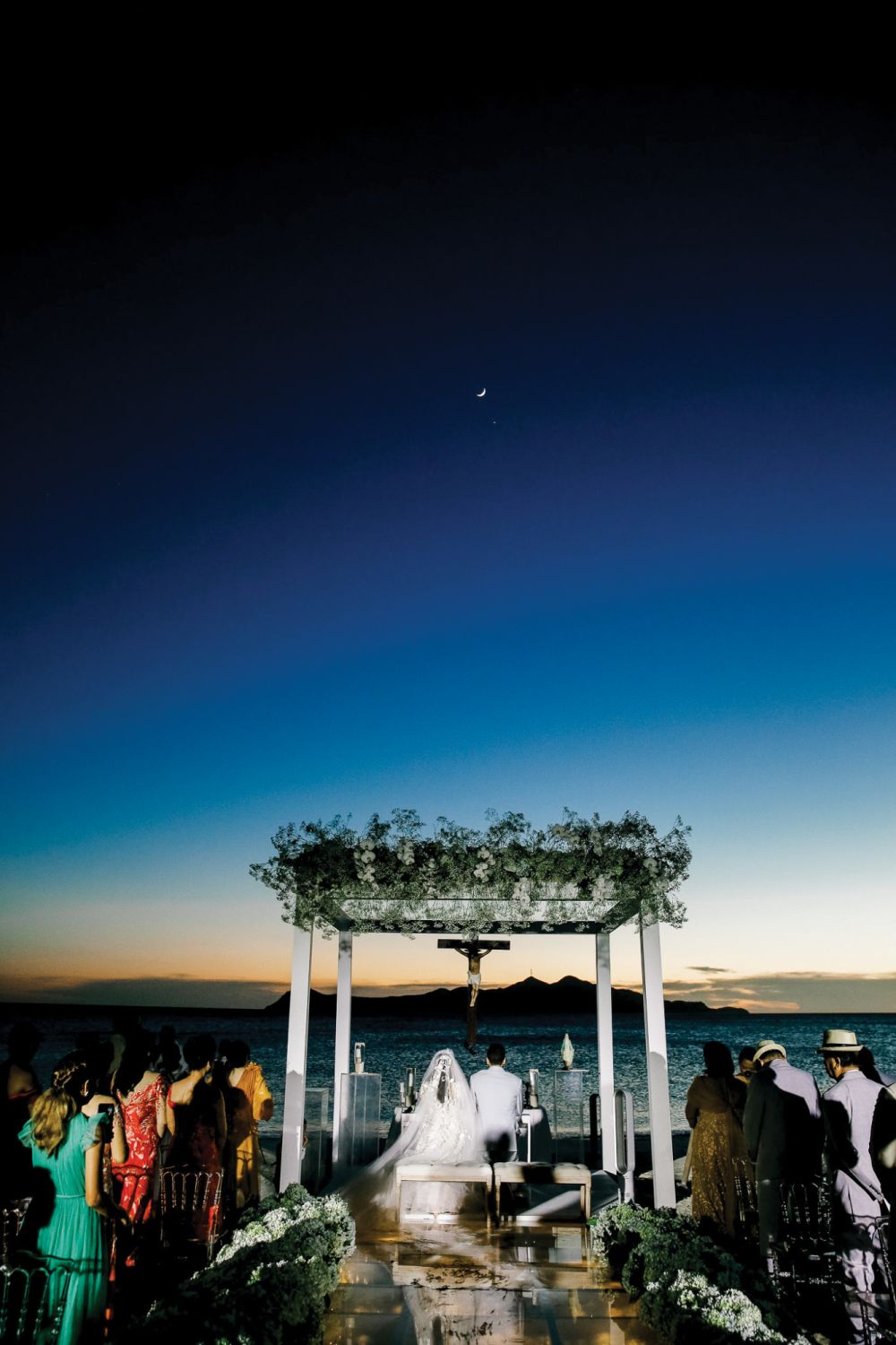 The couple tied the knot with the breathtaking hues of the sunset as the backdrop