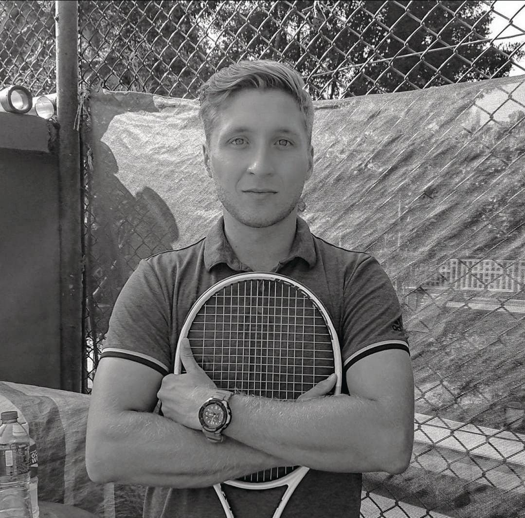 Cheung credits coach Stefan Yates with helping him win a recent tennis tournament