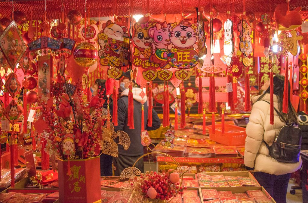 NANJING, CHINA - JANUARY 7, 2022 - Citizens buy Spring Festival decorations at a large festival supplies store in Nanjing, capital of East China's Jiangsu Province, Jan 7, 2022. (Photo credit should read Sun Zhongnan / Costfoto/Future Publishing via Getty Images)