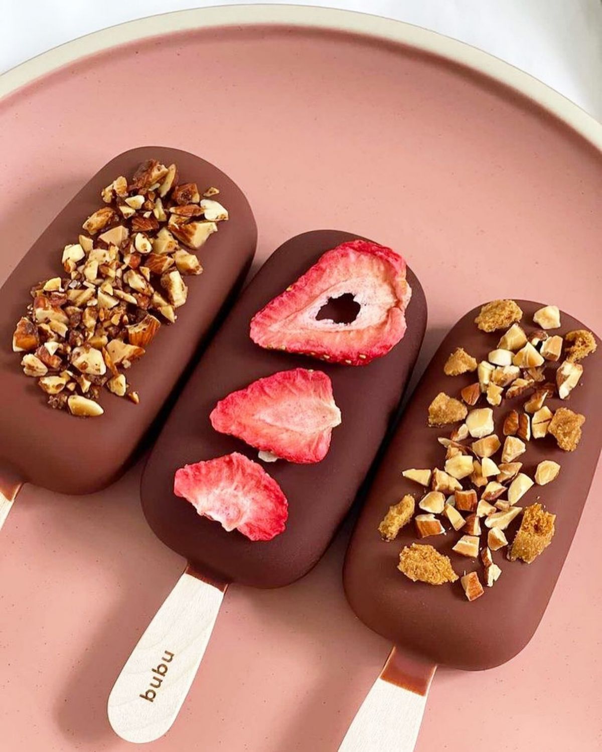 Plant-based vegan ice cream bars coated in Auro chocolate from Bubu (Photo: Instagram / @bububars)