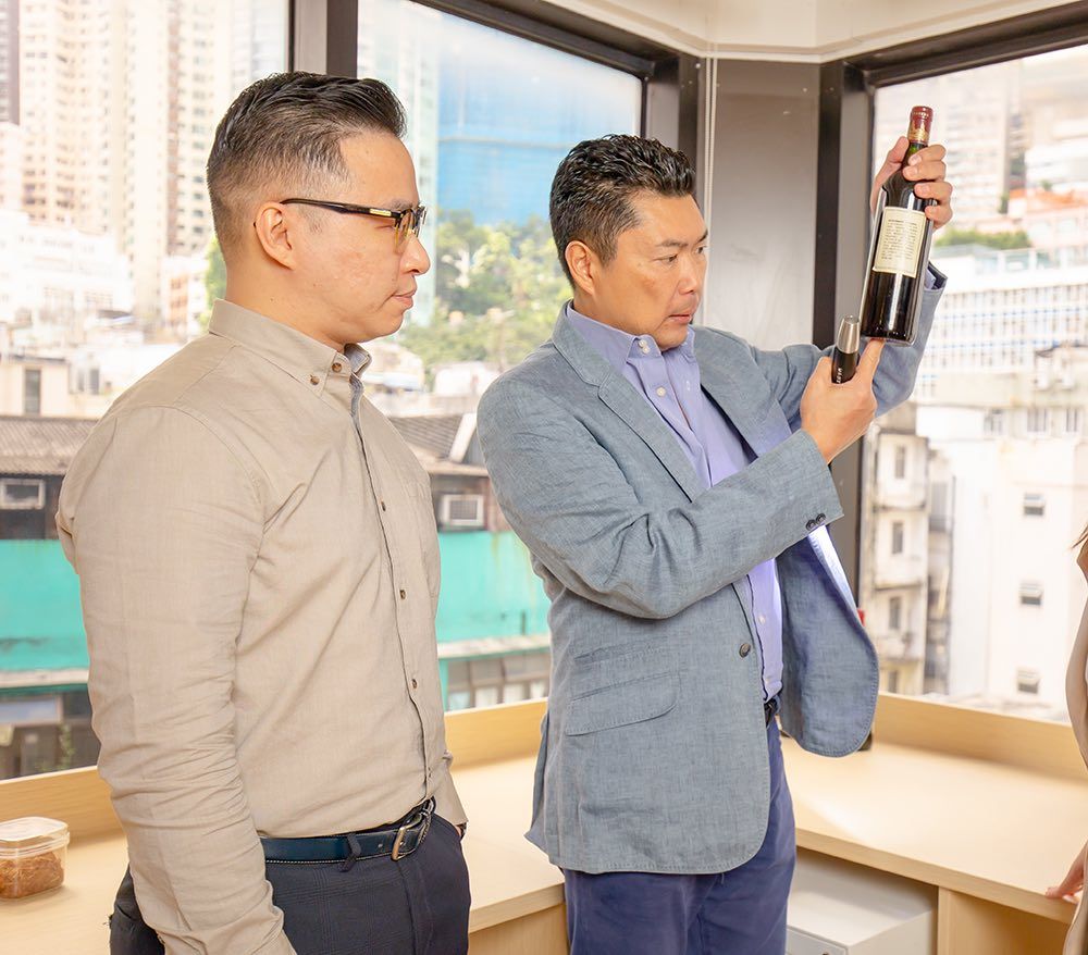 Simon Tam inspects bottles