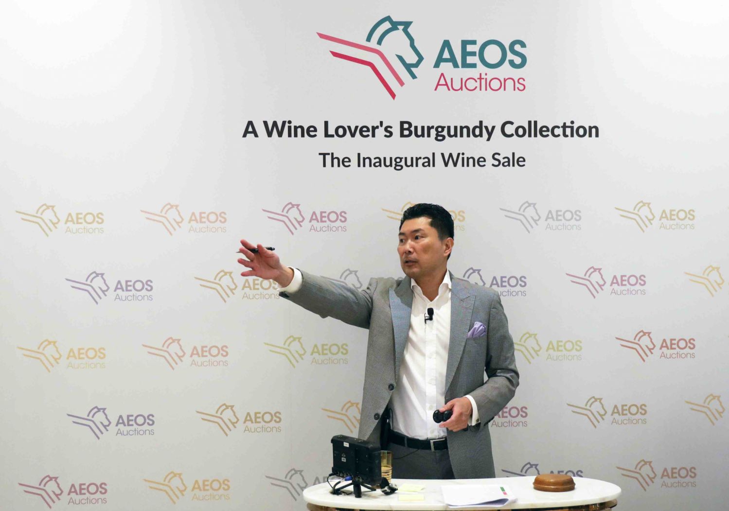 Aeos Auctions' founder Simon Tam taking bids at the inaugural auction
