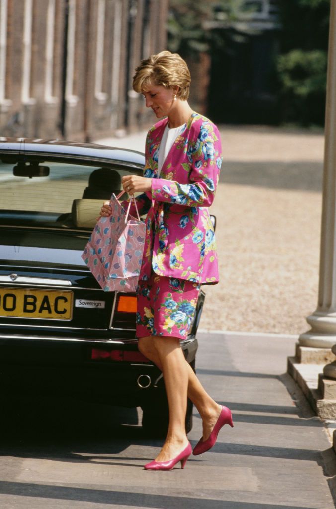 Diana, Princess of Wales (1961 - 1997) at Clarence House in London for the Queen Mother's 90th birthday, 4th August 1990. She is wearing a pink floral suit. (Photo by Jayne Fincher/Princess Diana Archive/Getty Images)