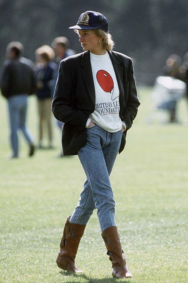 WINDSOR, UNITED KINGDOM - MAY 02: Diana, Princess Of Wales At Guards Polo Club. The Princess Is Casually Dressed In A Sweatshirt With The British Lung Foundation Logo On The Front, Jeans, Boots And A Baseball Cap. (Photo by Tim Graham Photo Library via Getty Images)