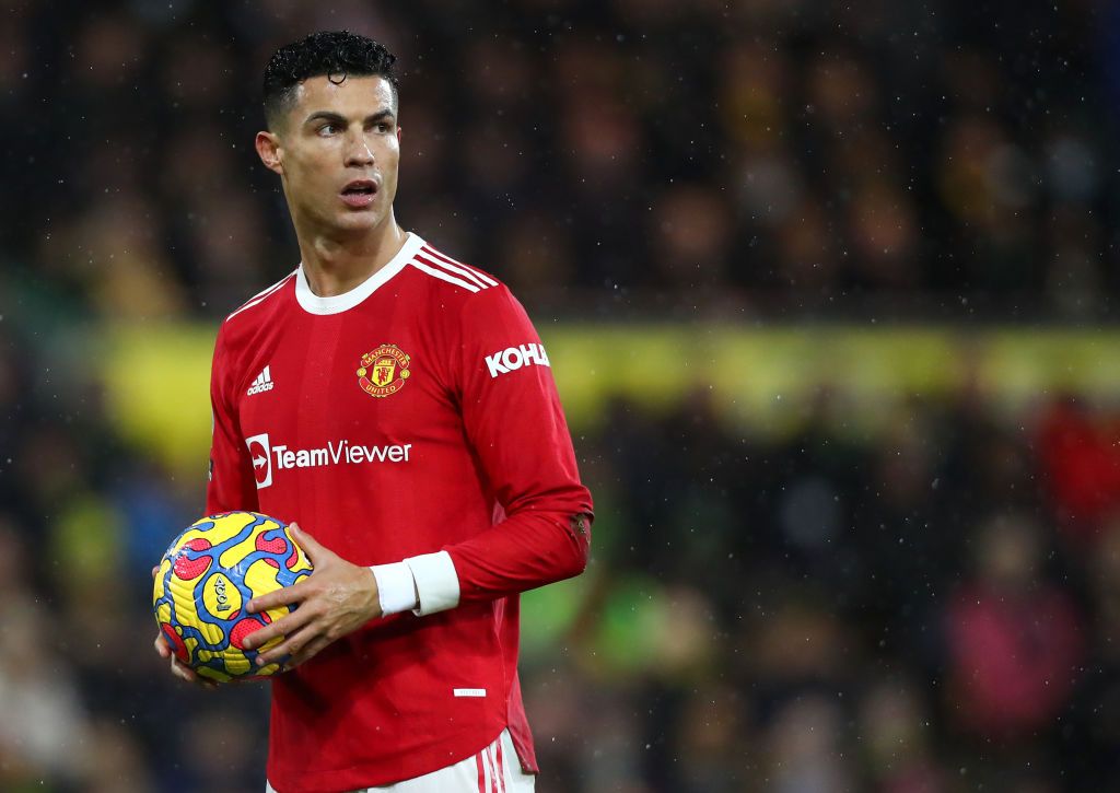 NORWICH, ENGLAND - DECEMBER 11: Christiano Ronaldo of Manchester United prepares to take a penalty during the Premier League match between Norwich City and Manchester United at Carrow Road on December 11, 2021 in Norwich, England. (Photo by Chloe Knott - Danehouse/Getty Images)