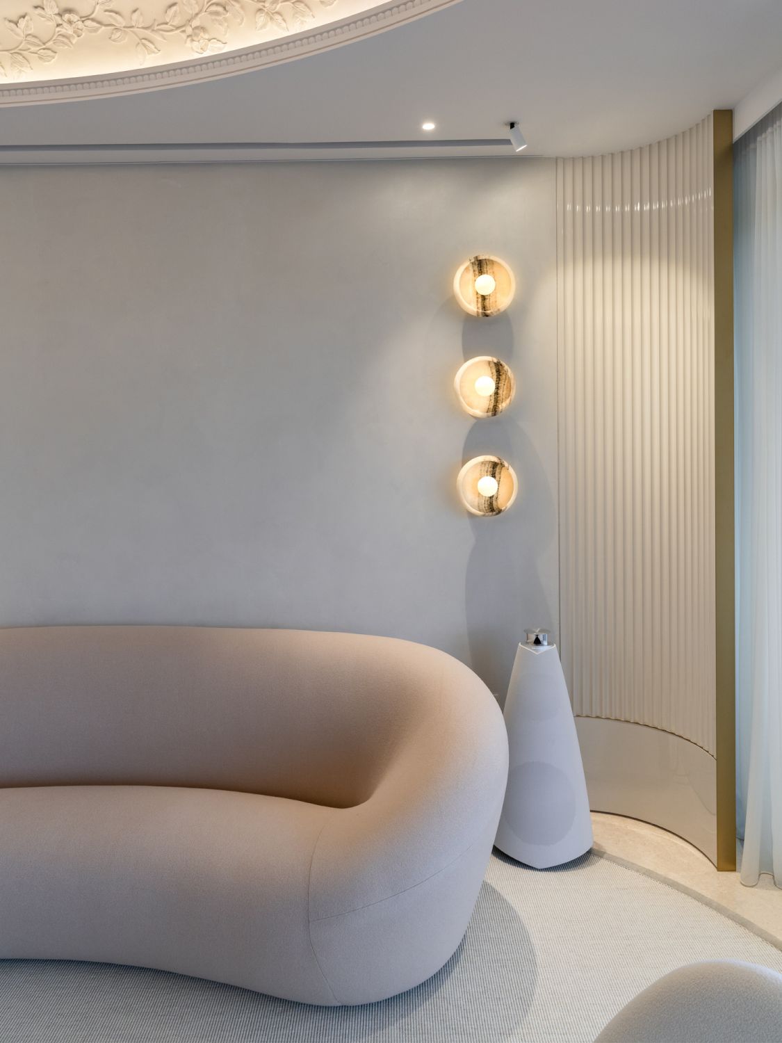 The home is dressed in a contemporary mix of materials that add warmth and elegance
