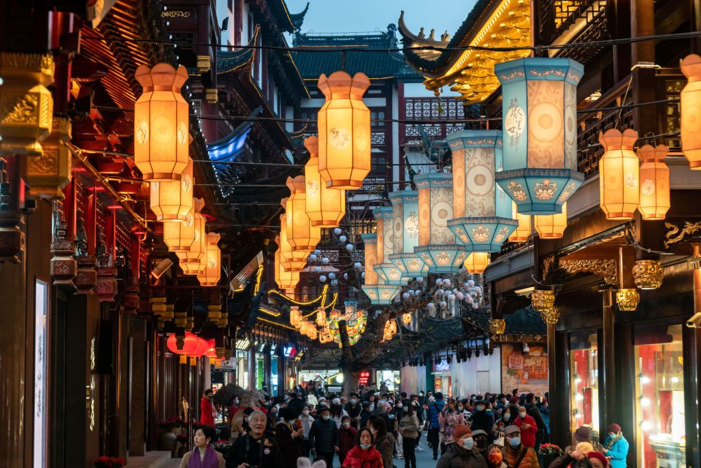 SHANGHAI, CHINA - JANUARY 19 2022: People walk under a lantern arcade in Yu Garden during the Spring Festival lantern show in Shanghai, China Wednesday, Jan. 19, 2022. (Photo credit should read WANG GANG/Future Publishing via Getty Images)