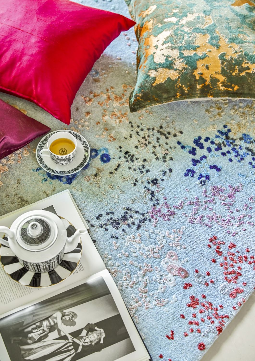 This lounge area designed by Prestige Global Designs is brightened up with an array of vibrant cushions