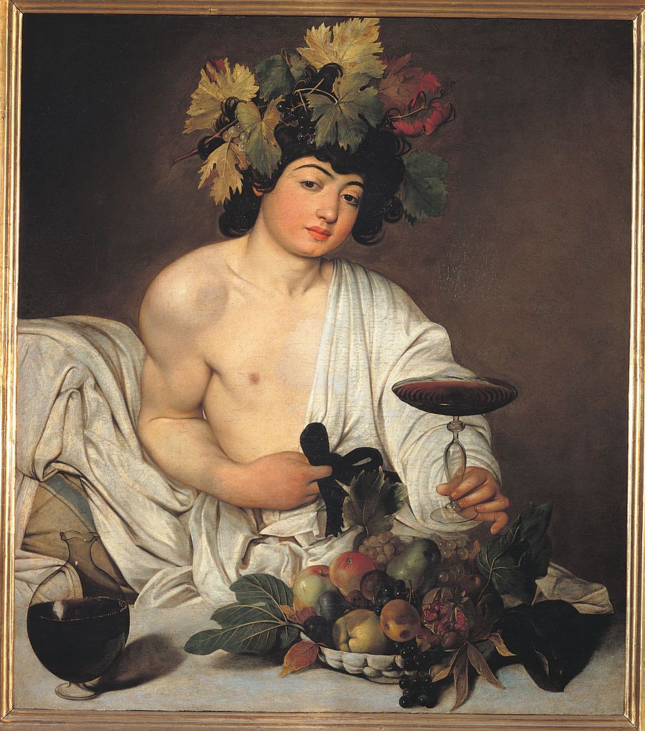Italy, Tuscany, Florence, Uffizi Gallery. In the Gallery collections since 1916. Whole artwork view. Cup chushion drape bedclothes cup chalice glass wine basket apples grapes leaves carafe bottle glass ribbon divinity Bacco.