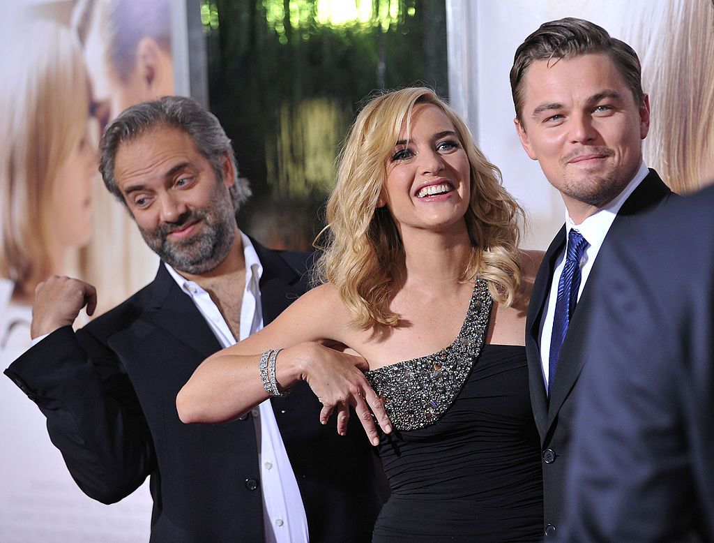 Director Sam Mendes, wife actress Kate Winslet and actor Leonardo DiCaprio arrive at the Los Angeles Premiere "Revolutionary Road" at the Mann Village Theater on December 15, 2008 in Westwood, California. (Photo by Jon Kopaloff/FilmMagic)