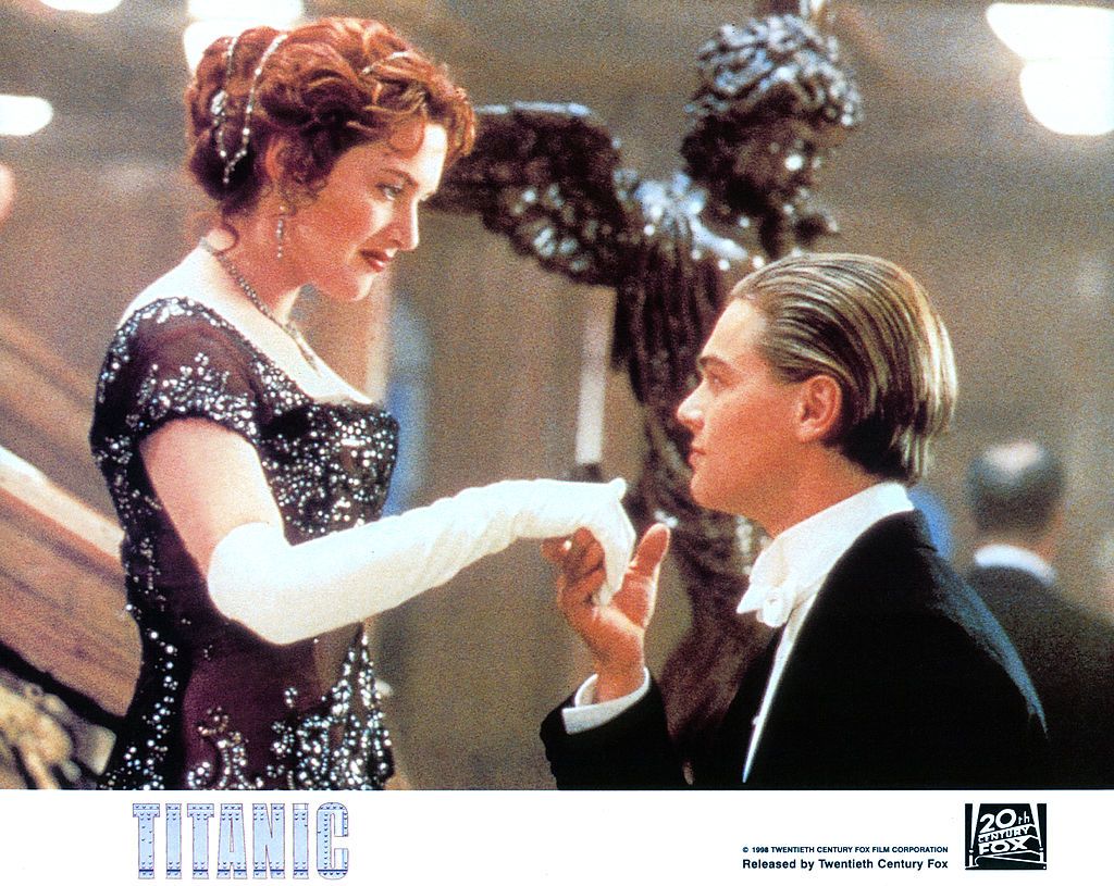 Kate Winslet offers her hand to Leonardo DiCaprio in a scene from the film 'Titanic', 1997. (Photo by 20th Century-Fox/Getty Images)