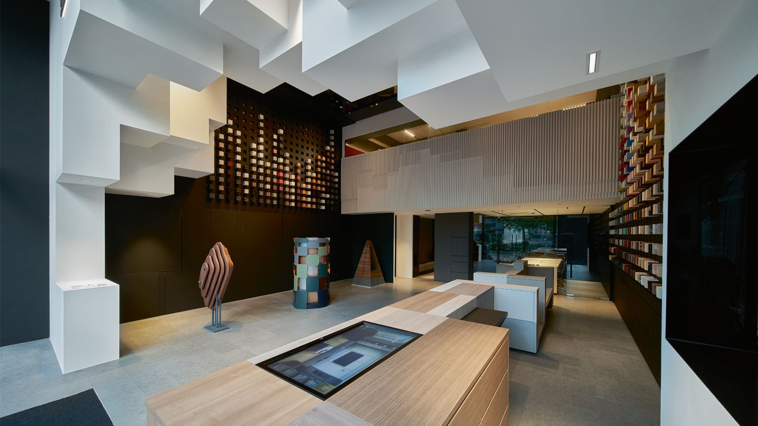 The showroom's ceiling near the entrance highlights an eye-catching pixellated design