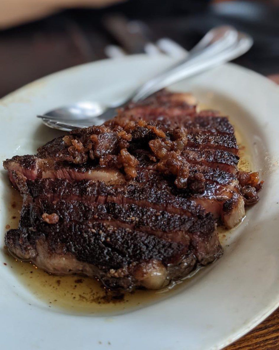 A sizzling steak from Mamou | Photo: @mymamou/Instagram