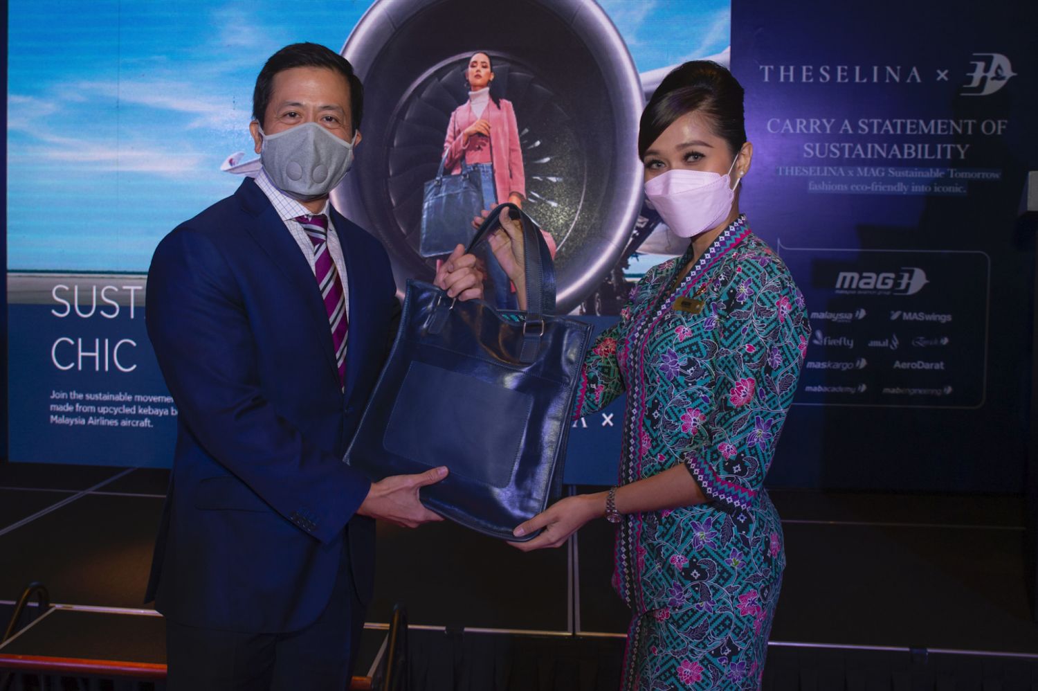 Yong Yoon Li selected the Lima Hotel Romeo (LHR) navy blue leather bag.