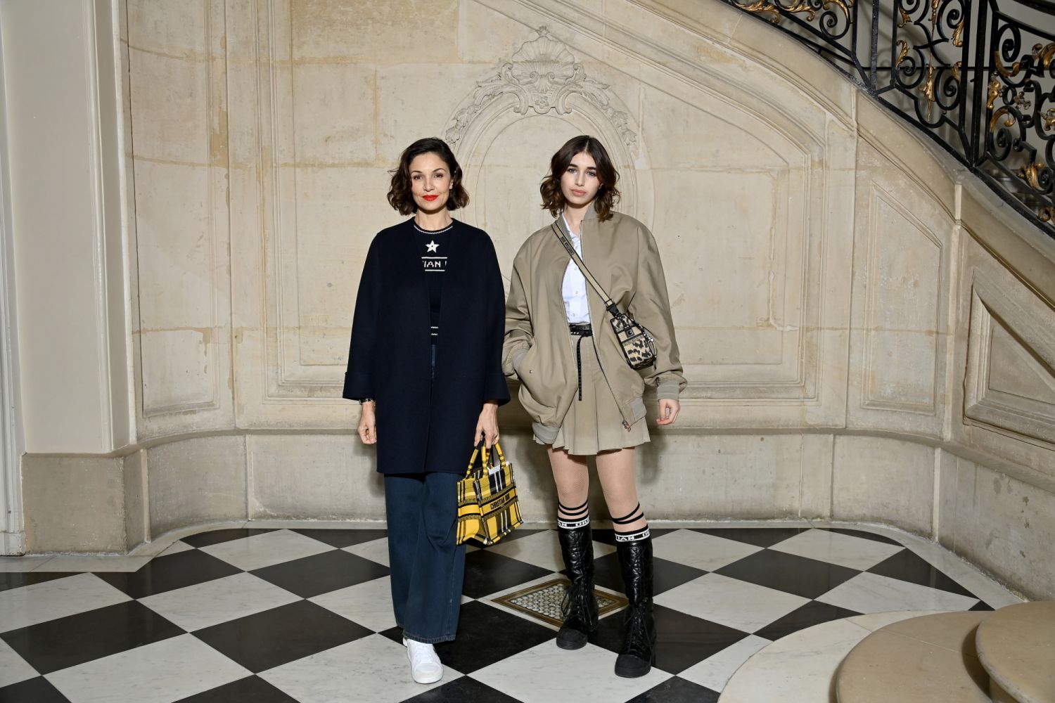 PARIS, FRANCE - JANUARY 24: Nadia Fares and a guest attend the Dior Haute Couture Spring/Summer 2022 show as part of Paris Fashion Week on January 24, 2022 in Paris, France. (Photo by Pascal Le Segretain/Getty Images For Dior)