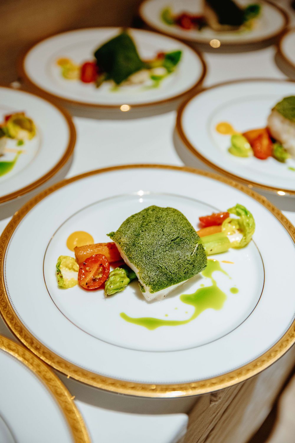 Black cod with pumpkin cream, asparagus and a herb crust
