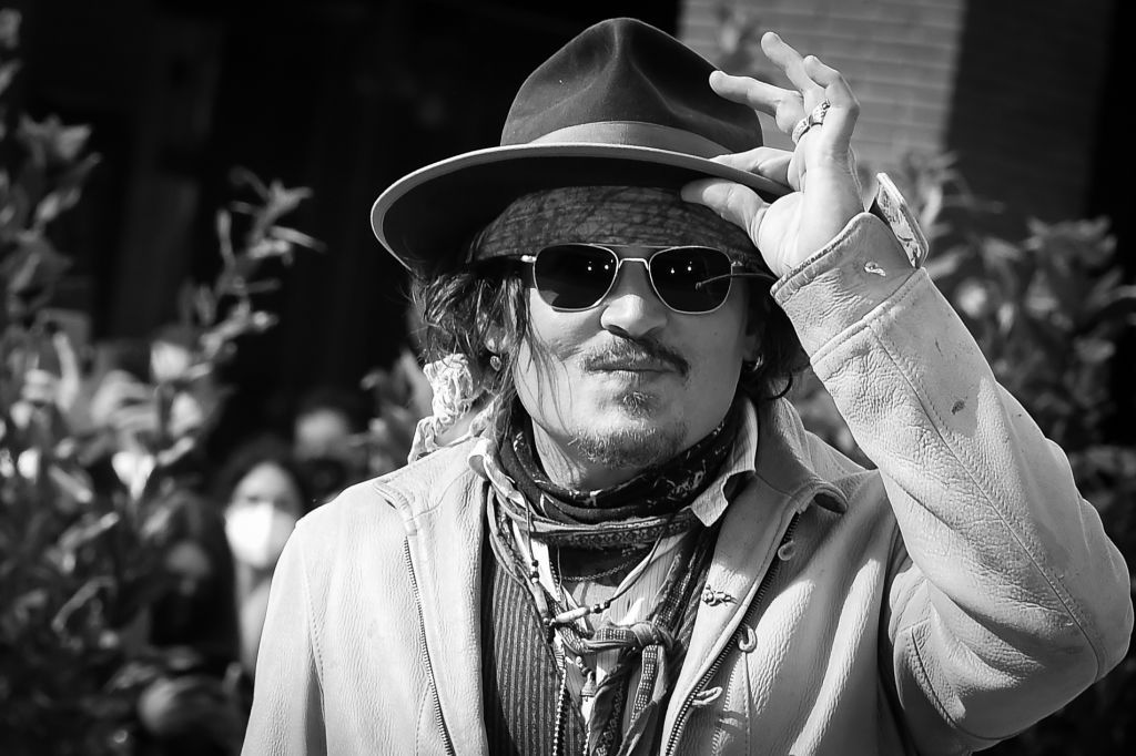 ROME, ITALY - OCTOBER 17: (EDITOR'S NOTE: This image has been converted to black and white) Johnny Depp at the Puffins photocall during the Rome Film Fest 2021 on October 17, 2021 in Rome, Italy. (Photo by Marilla Sicilia/Archivio Marilla Sicilia/Mondadori Portfolio via Getty Images)