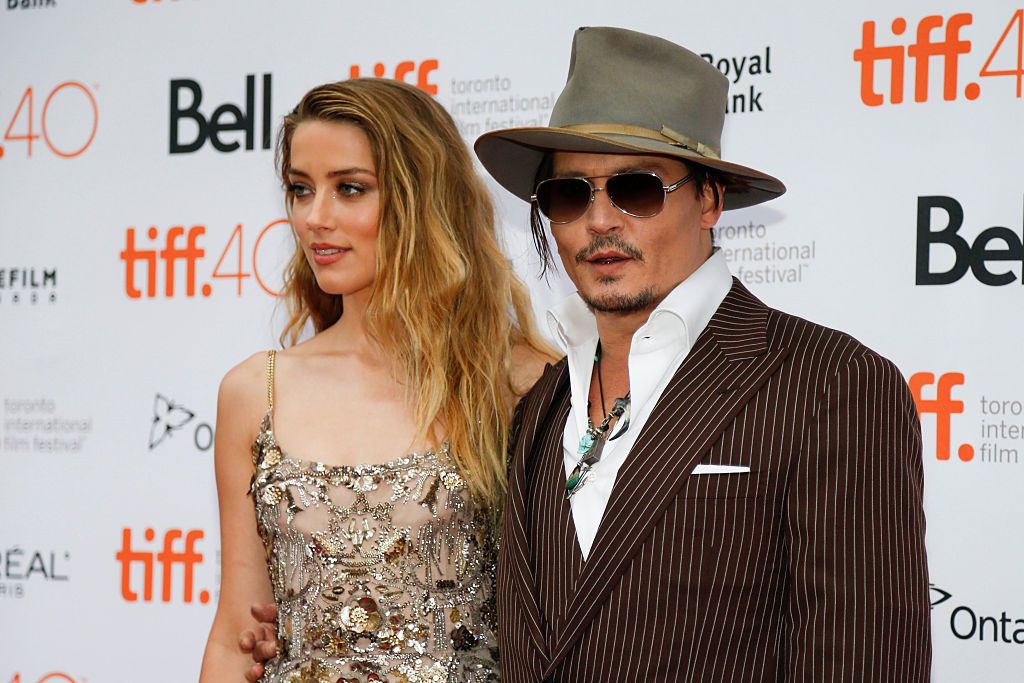 TORONTO, ON - SEPTEMBER 12 - Amber Heard and Johnnie Depp arrive at the Princess of Wales Theatre for the screening of The Danish Girl, Toronto, September 12, 2015.        (Bernard Weil/Toronto Star via Getty Images)
