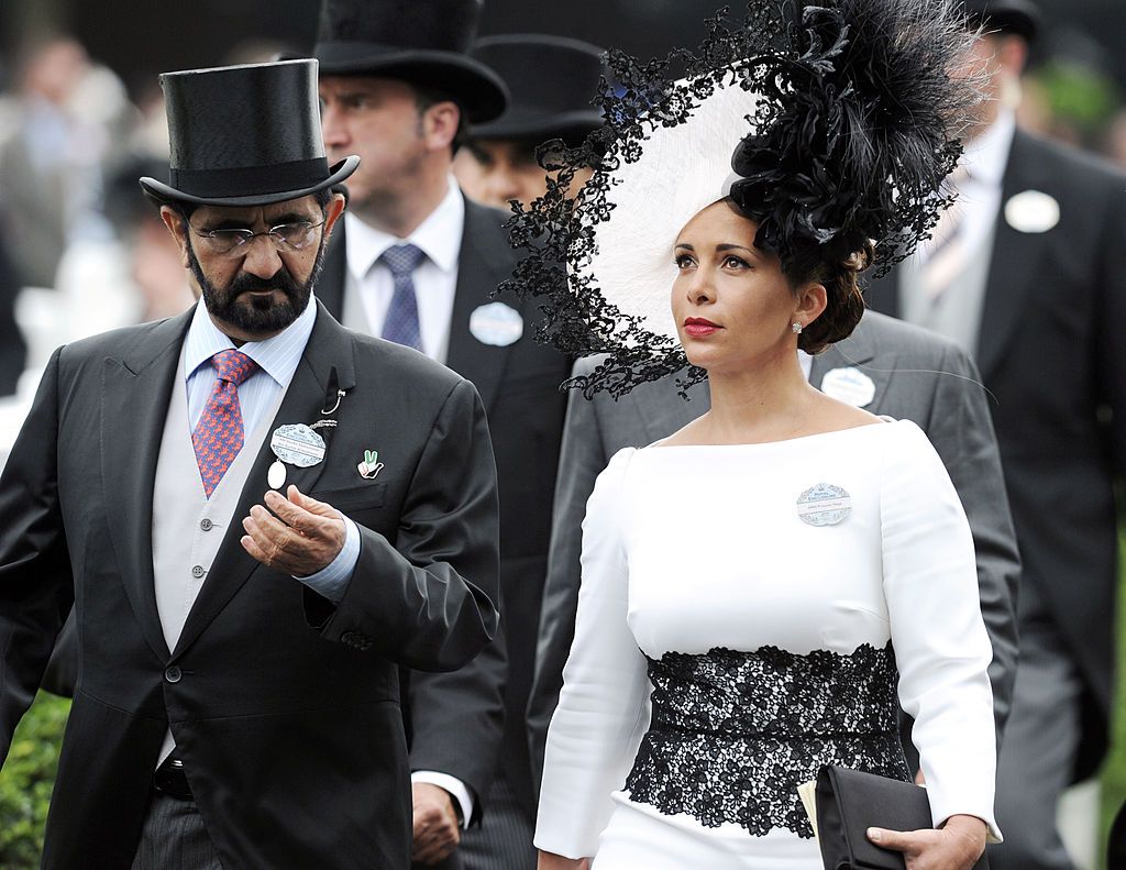 ASCOT, ENGLAND - JUNE 19: Sheikh Mohammed Bin Rashid Al Maktoum and Princess Haya Bint Al Hussein of Jordan attend Day 3 of Royal Ascot at Ascot Racecourse on June 19, 2014 in Ascot, England.  (Photo by Stuart C. Wilson/Getty Images)