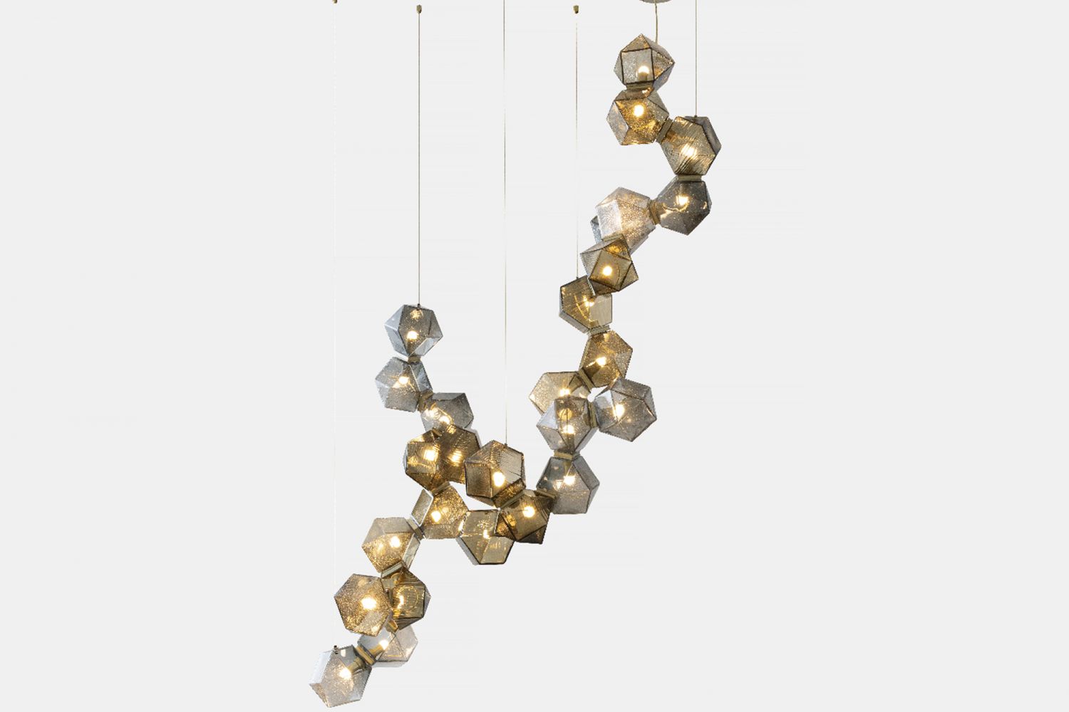 The new textured glass finish for The Welles Chandelier is crafted from delicate blown glass