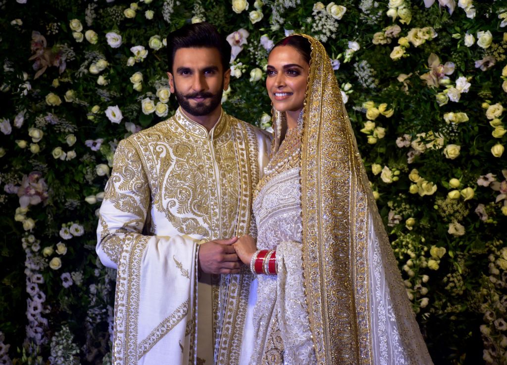 MUMBAI, INDIA - 2018/11/28: Actor Ranveer Singh with wife Deepika Padukone are seen during their wedding reception at the hotel Grand Hyatt in Mumbai. (Photo by Azhar Khan/SOPA Images/LightRocket via Getty Images)