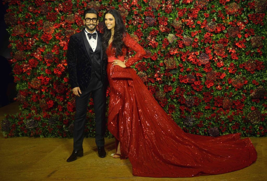 MUMBAI, MAHARASHTRA-DECEMBER 01: Ranveer Singh and Deepika Padukone pose for photographs before their reception in Mumbai. (Photo by Milind Shelte/The India Today Group via Getty Images)