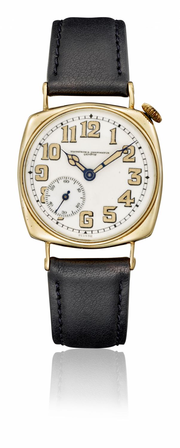 cushion shape, 18K yellow gold, winding-crown at 1.30, round shape white enamel dial with 11 black enamel skeletonized and luminescent Arabic numerals, small seconds at 7.30 1919