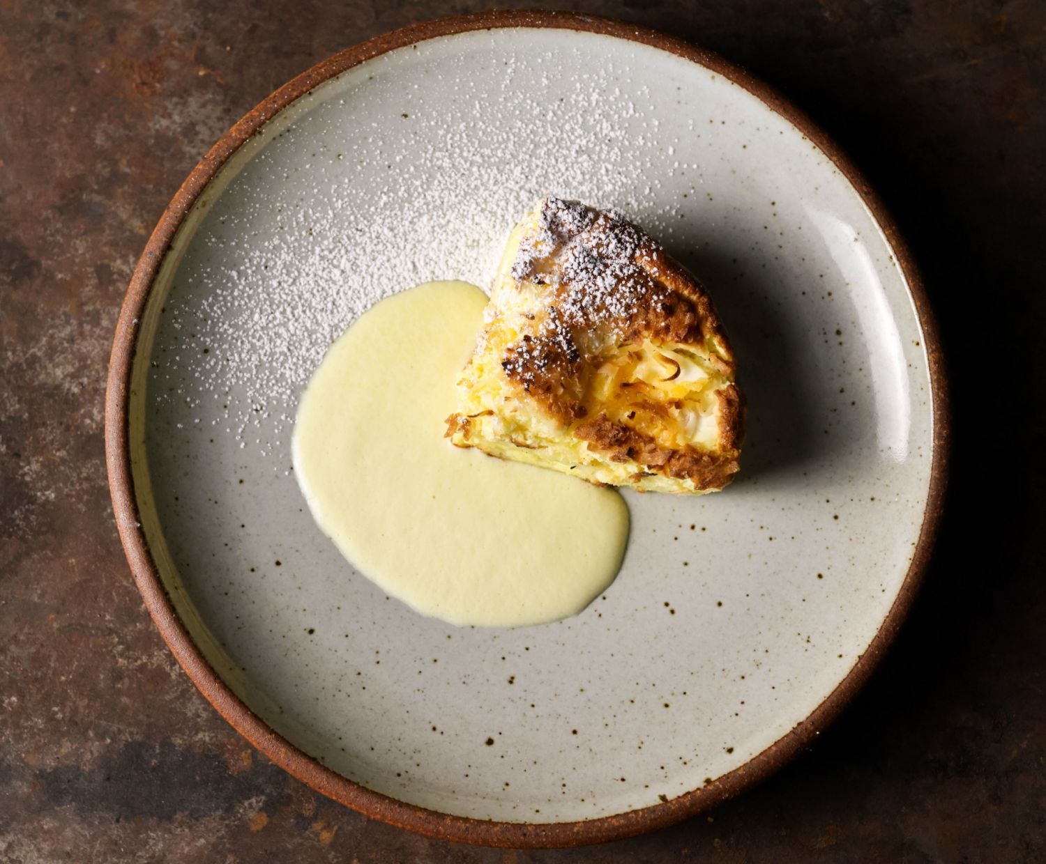 Hiraya bibingka Basque cheesecake with salted egg and coconut anglaise (Photo Instagram / @dcfastcasual)