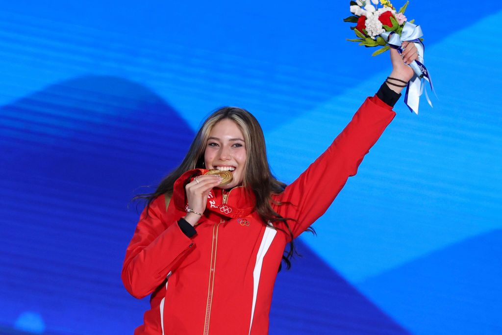BEIJING, CHINA - FEBRUARY 08: Gold medallist Ailing Eileen Gu of Team China celebrates during the Women's Freestyle Skiing Freeski Big Air medal ceremony on Day 4 of the Beijing 2022 Winter Olympic Games at Beijing Medal Plaza on February 08, 2022 in Beijing, China. (Photo by Jean Catuffe/Getty Images)