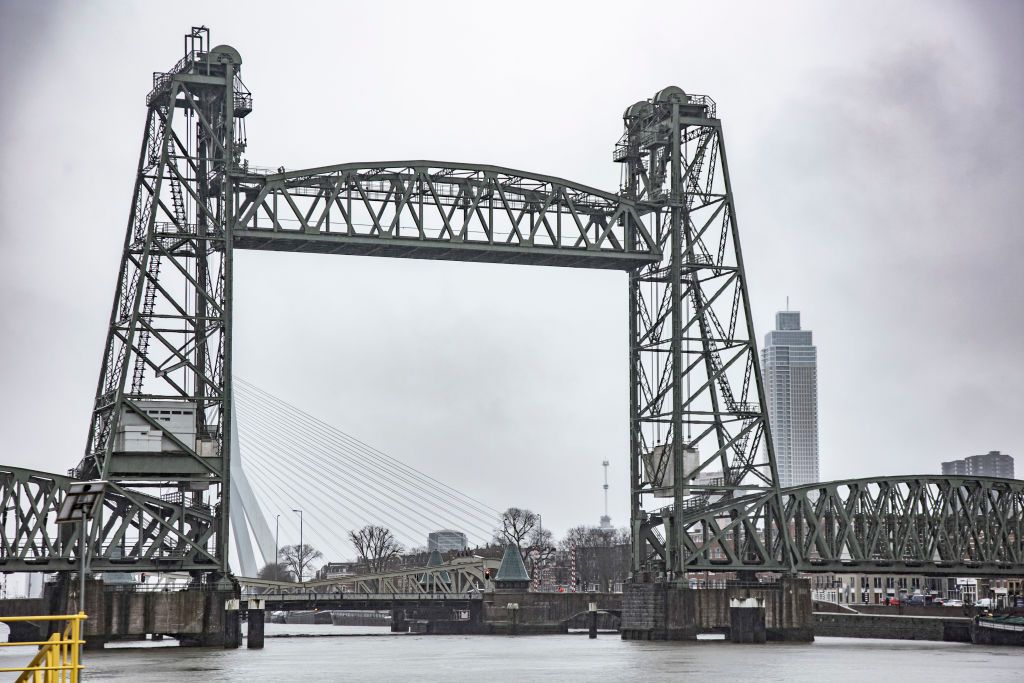 The iconic historic De Hef - Koningshavenbrug Bridge in the Dutch port city of Rotterdam may be dismantled for Jeff Bezos superyacht to pass under, as the mast of the sailboat exceeds the height of the bridge. The two-tower with swing lift bridge is an old level steel railroad bridge connecting the island, Noordereiland in the Maas river in the Southern part of Rotterdam. The bridge was built in 1877 and suffered damage during the 1940 German bombings. Since 2017 after the renovation work, the municipality