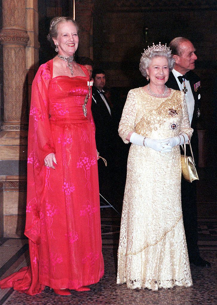 Queen Elizabeth II and Queen Margrethe of Denmark welcome guests at reception hosted by the Danish Queen at The Natural History Museum on February 17, 2000 (Photo by Anwar Hussein/WireImage)