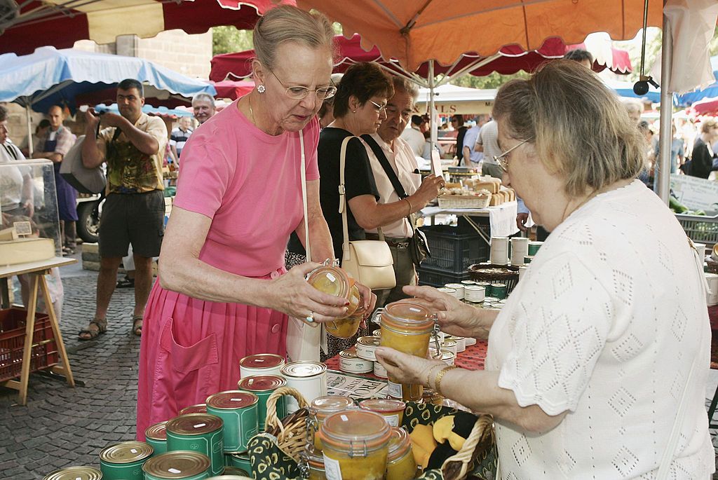CAHORS, FRANCE - AUGUST 11: Danish Queen Margrethe II vistis the local market on August 11, 2004 in Cahors, France. (Photo by Pascal Le Segretain/Getty Images)