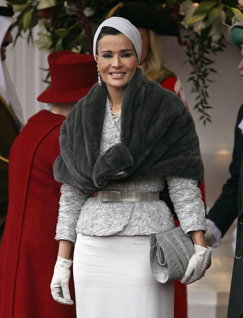 WINDSOR, UNITED KINGDOM - OCTOBER 26: (EMBARGOED FOR PUBLICATION IN UK NEWSPAPERS UNTIL 48 HOURS AFTER CREATE DATE AND TIME) Sheikha Mozah bint Nasser Al-Missned at the ceremonial welcome for The Emir of the State of Qatar, Sheikh Hamad bin Khalifa Al-Thani and Her Highness Sheikha Mozah during their State Visit on October 26, 2010 in Windsor, England. The Sheikh is on a two day State visit to the UK, the first since 1985, which is seen as important in strengthening already strongly established business lin